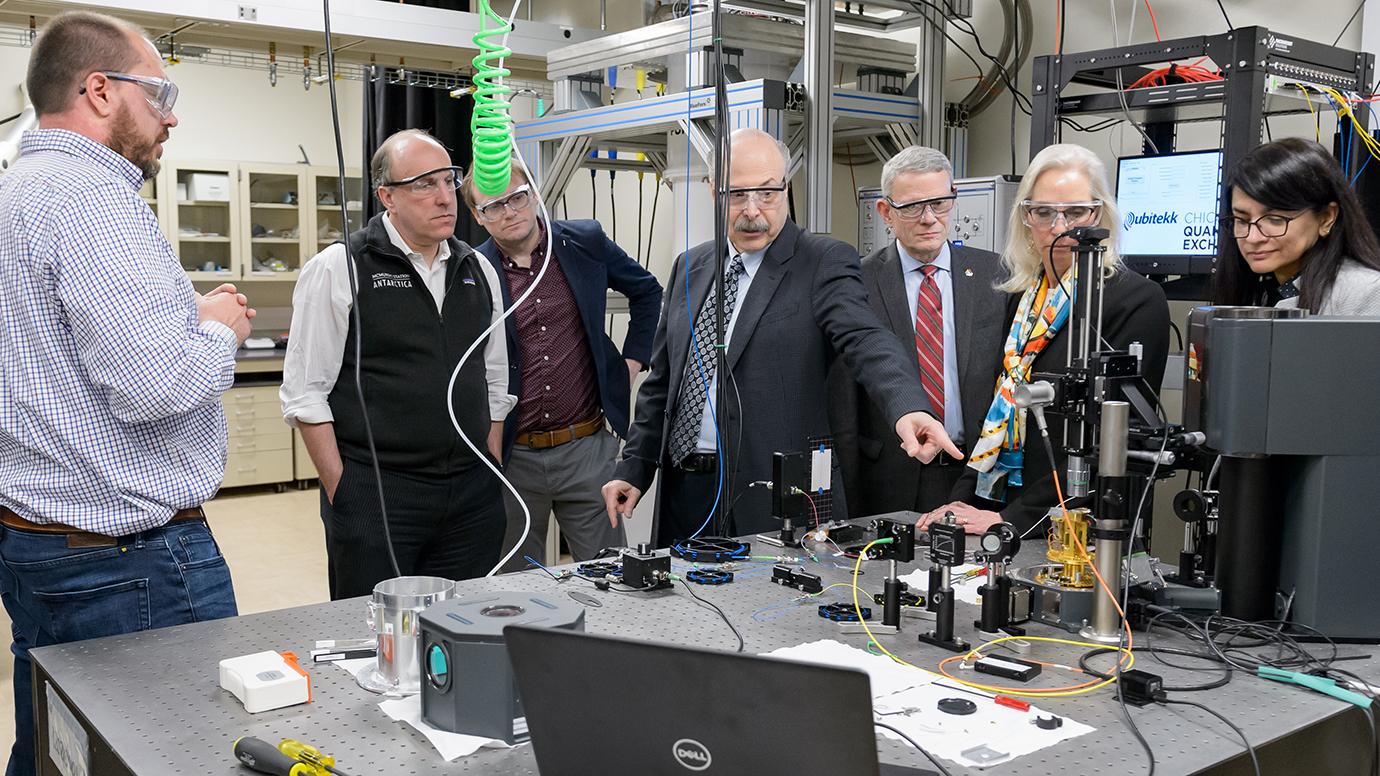 University of Chicago and Argonne scientist David Awschalom (center) discusses quantum entanglement with Department of Energy Under Secretary for Science Paul Dabbar (second from the left) and other laboratory, DOE and University leaders and researchers.